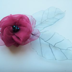 Red flower ; brooch