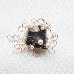 Fragments of Pottery ; brooch